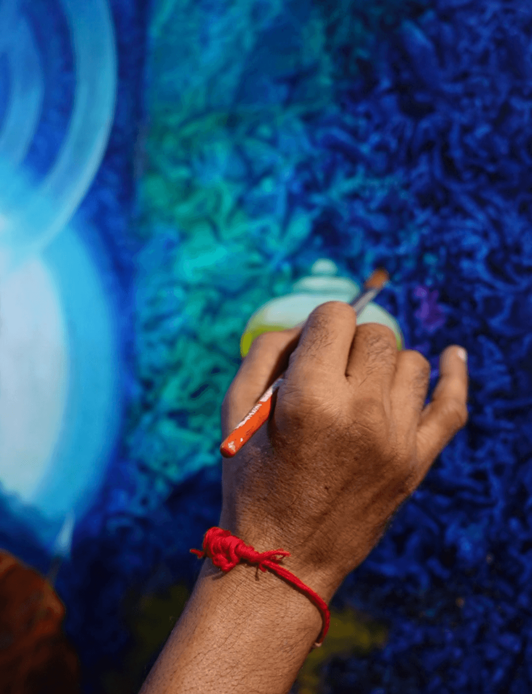 Close-up: hands with colour